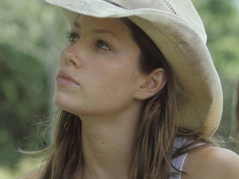 woman in straw hat outdoors