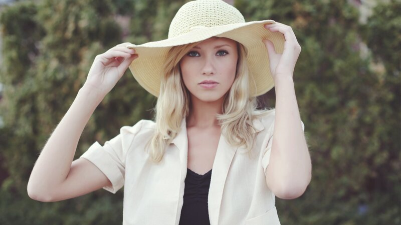 woman in straw hat outdoors