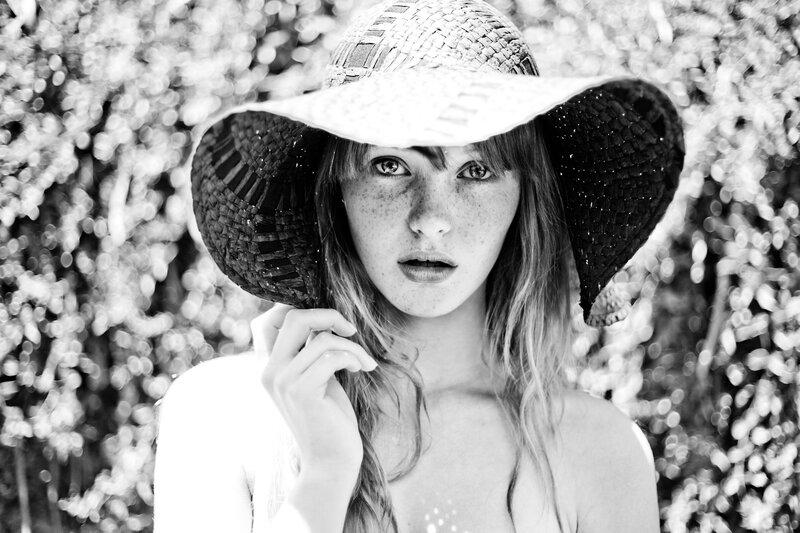 woman in straw hat portrait