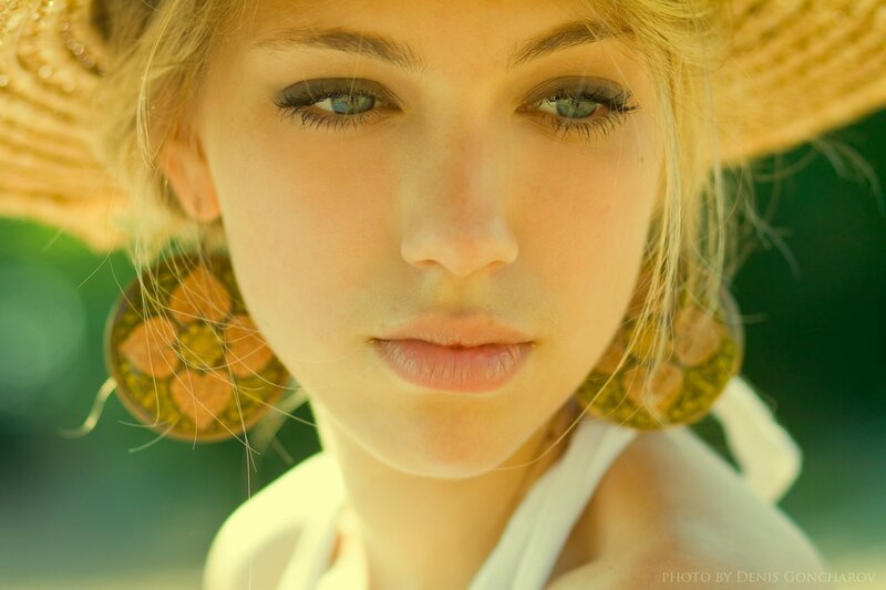 woman in straw hat portrait