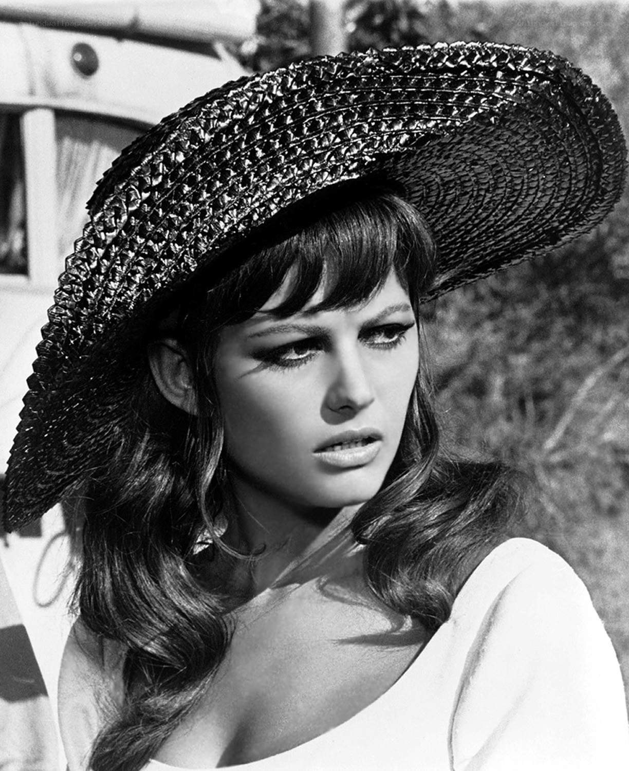Woman in straw hat portrait