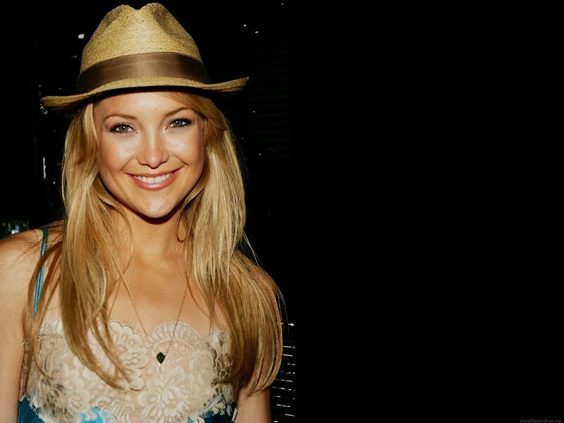 woman in straw hat smiling