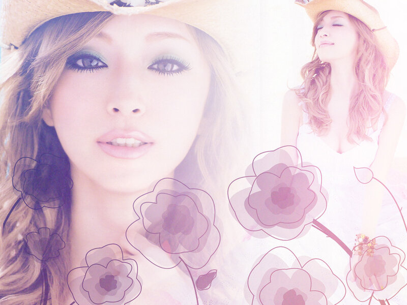 woman in straw hat with flowers