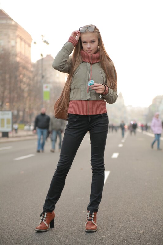 Woman in street with sunglasses