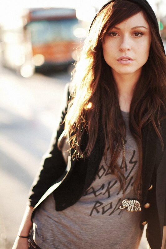 woman in street with sunlight