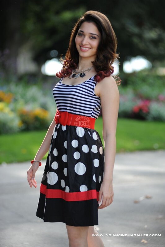 woman in striped and polka dot dress
