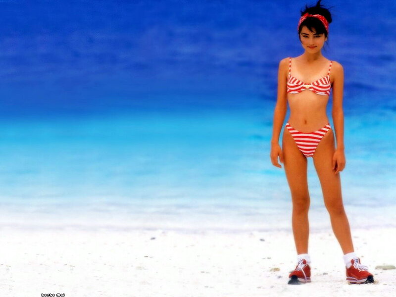woman in striped bikini on beach