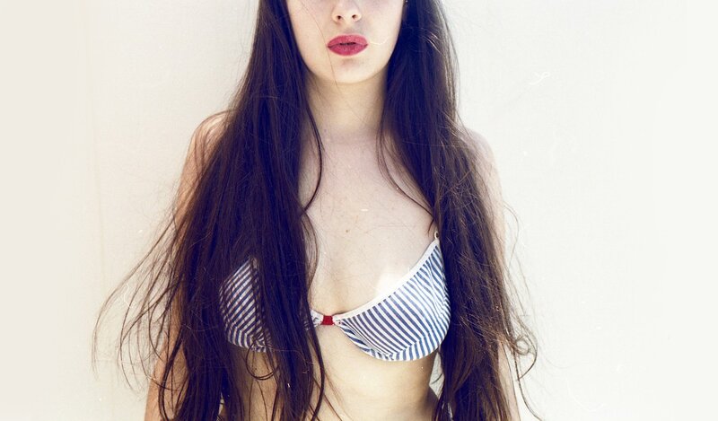 woman in striped bikini top