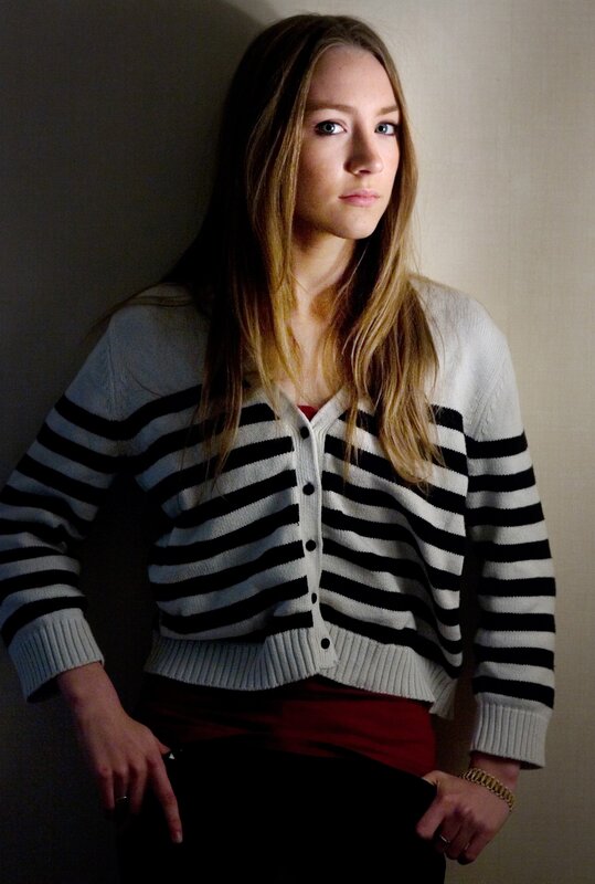 woman in striped cardigan