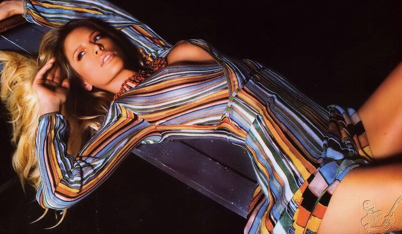 woman in striped dress lying down