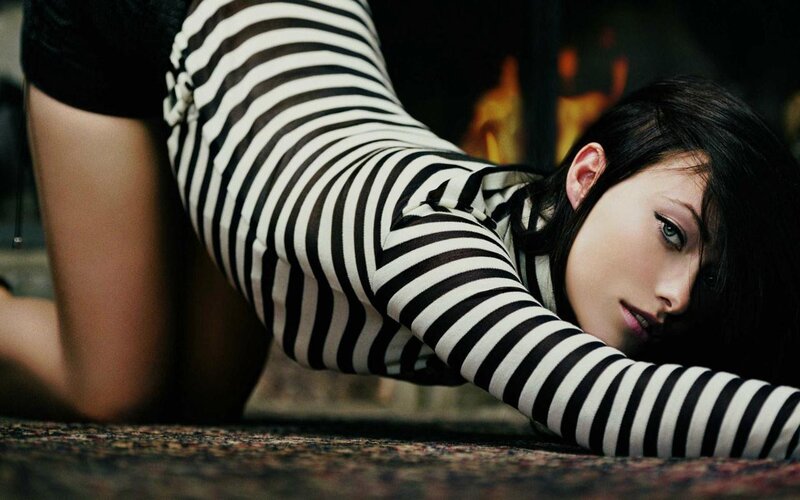 woman in striped dress lying down