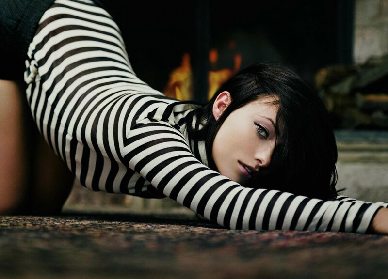woman in striped dress lying down
