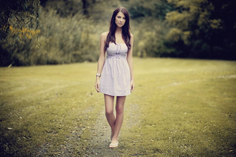 woman in striped dress on path