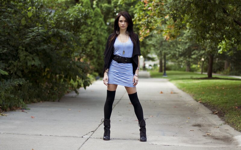 woman in striped dress on path