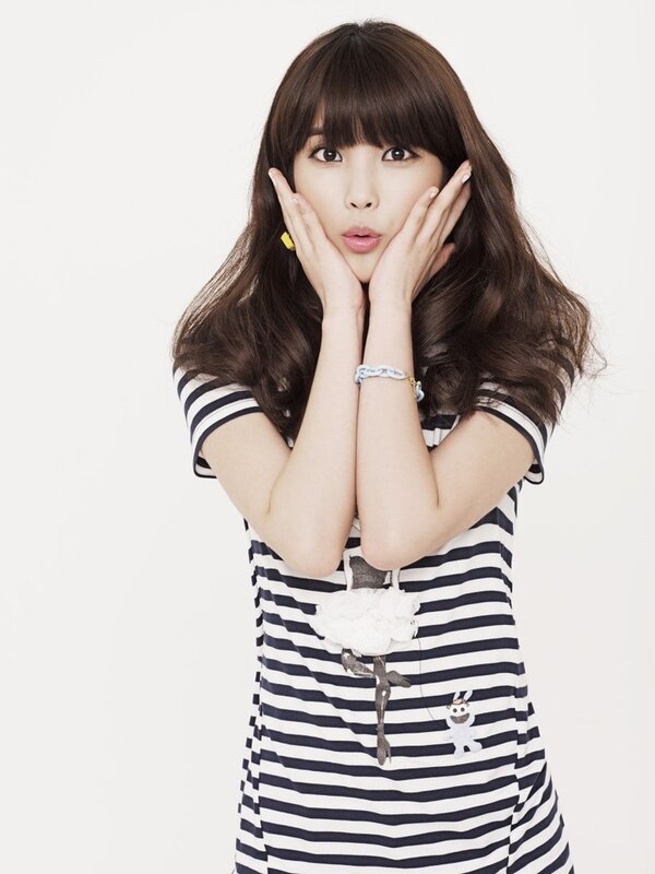 woman in striped dress posing