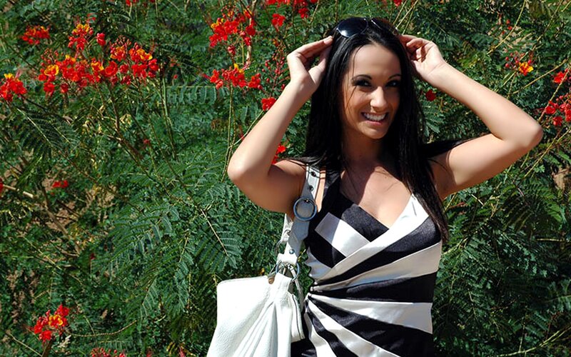 Woman in striped dress smiling