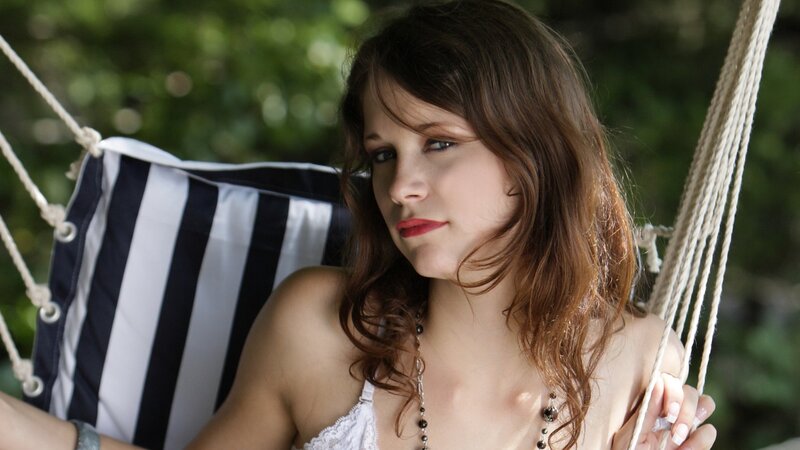 woman in striped hammock