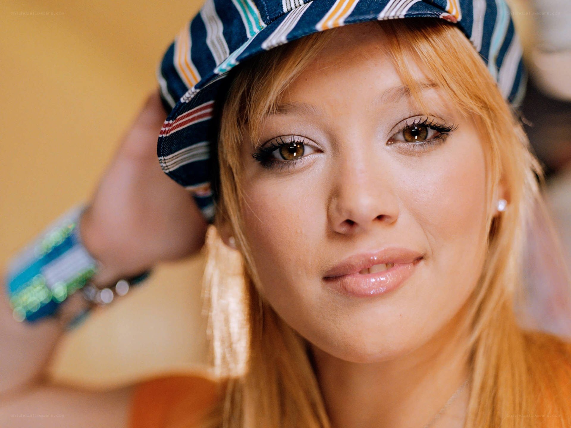 woman in striped hat
