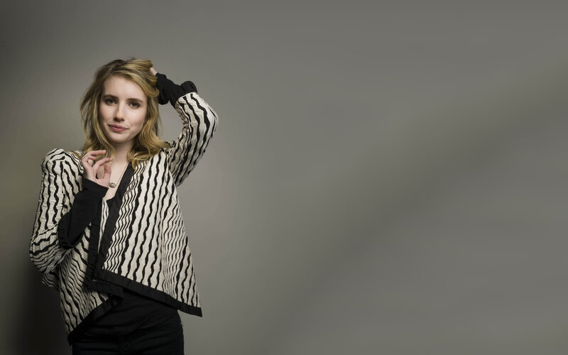 woman in striped jacket