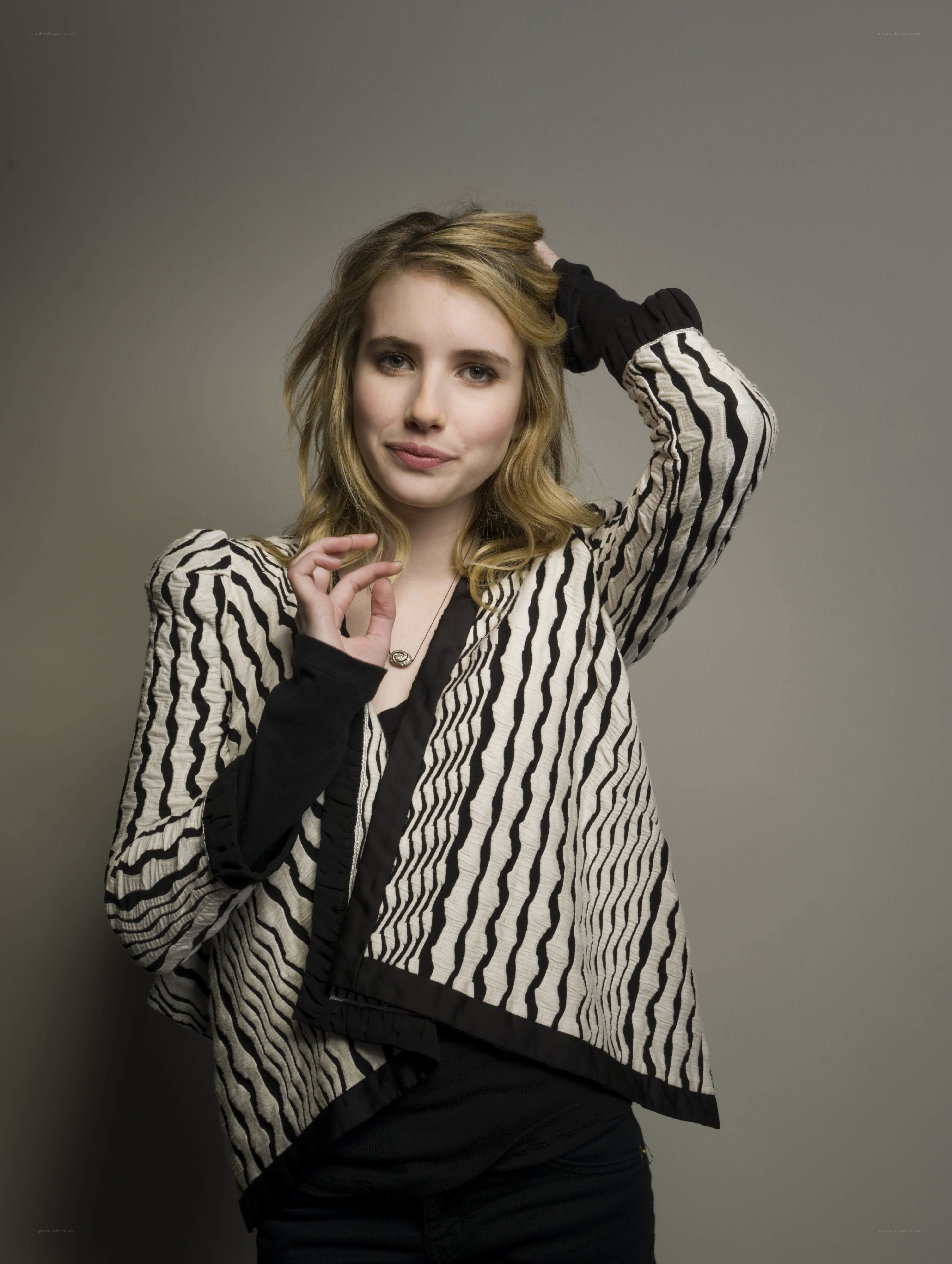 woman in striped jacket