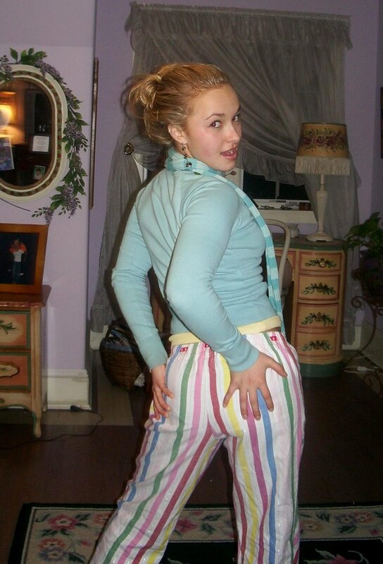 woman in striped pants posing