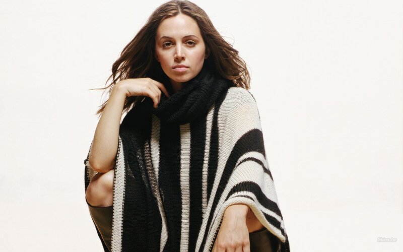 woman in striped poncho