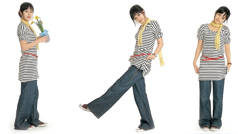 woman in striped shirt and jeans