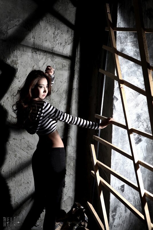Woman in Striped Shirt — Black, Dramatic, Photograph, Ladder, Concrete Wall, Window