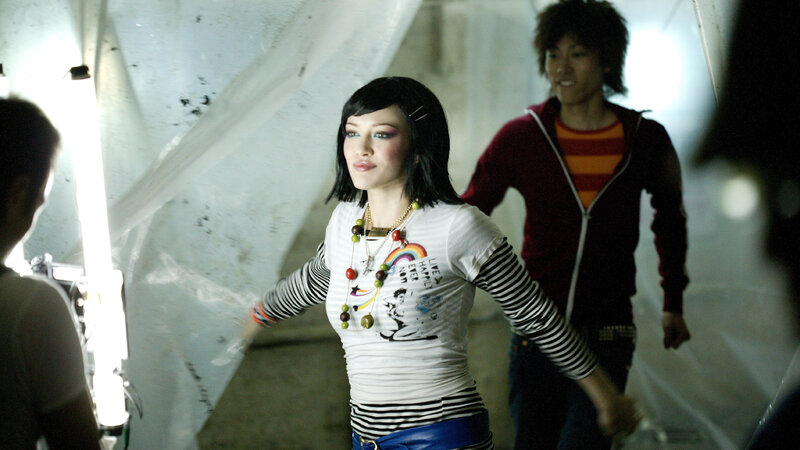 woman in striped shirt dancing