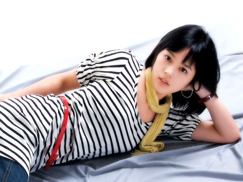 woman in striped shirt lying down