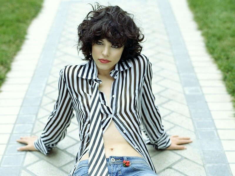 woman in striped shirt on path