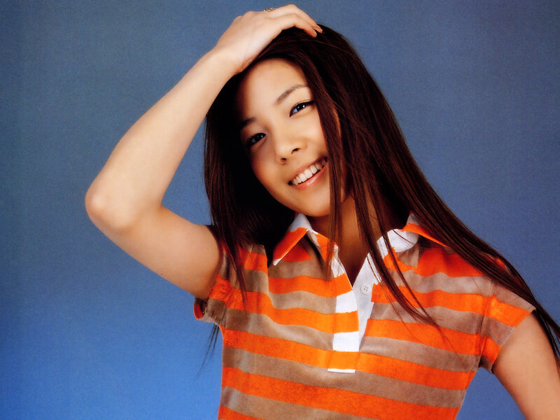 Woman in Striped Shirt — Orange