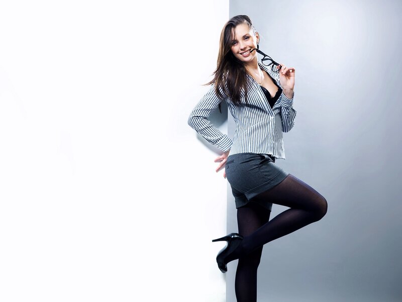 woman in striped shirt posing