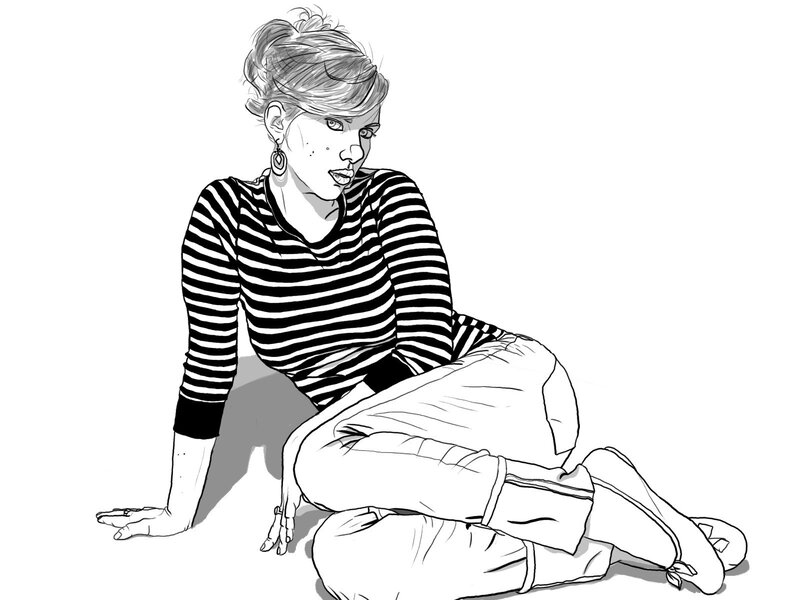 woman in striped shirt sitting