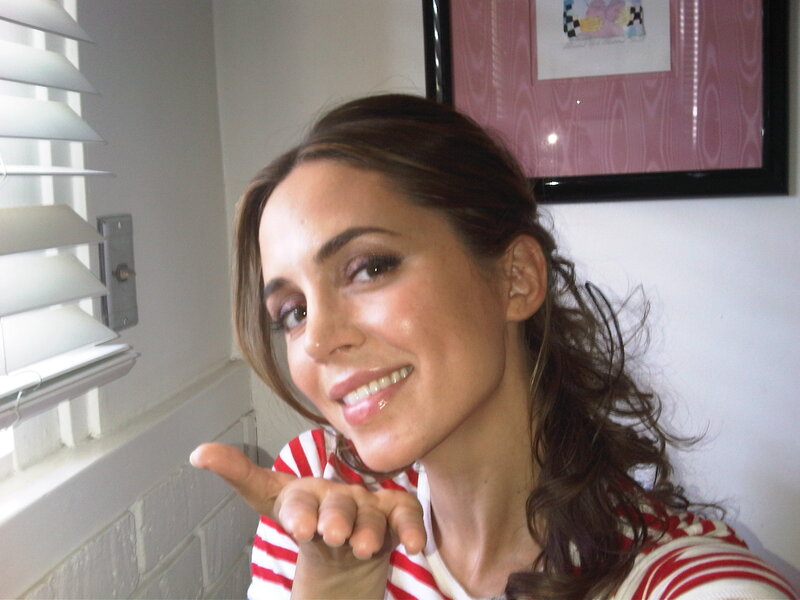 woman in striped shirt smiling