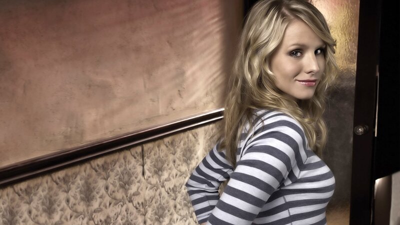 woman in striped shirt smiling