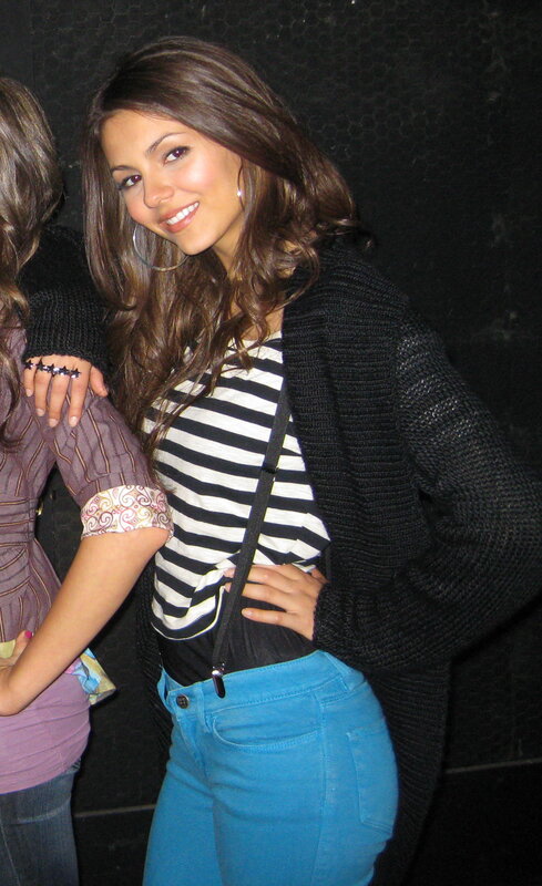 woman in striped shirt smiling