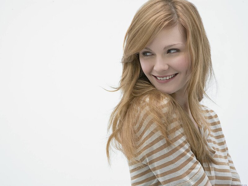 woman in striped shirt smiling