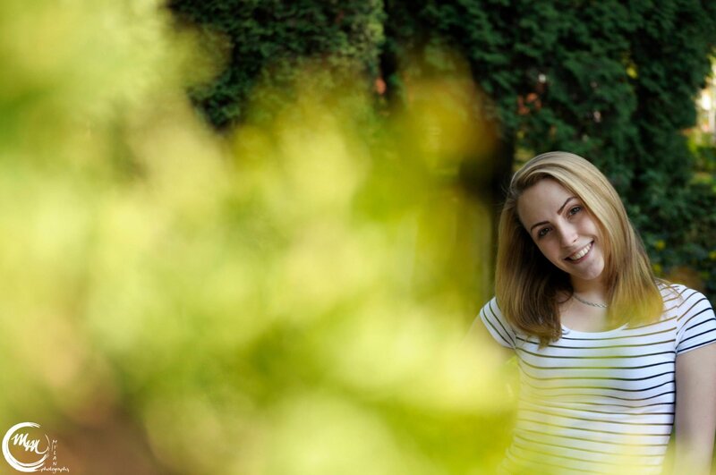 woman in striped shirt smiling