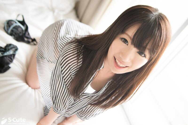 woman in striped shirt smiling