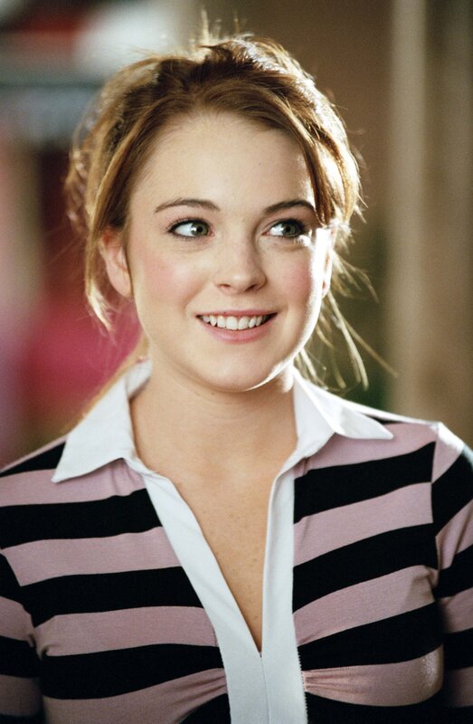 woman in striped shirt smiling