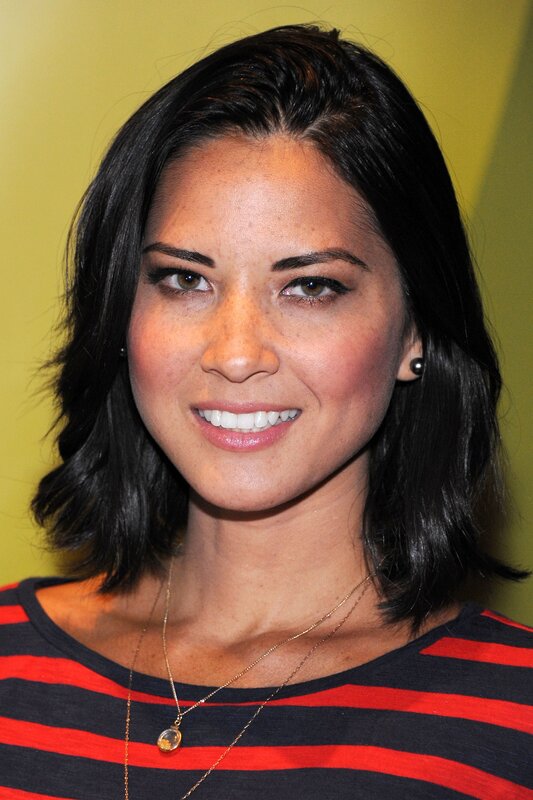 woman in striped shirt smiling