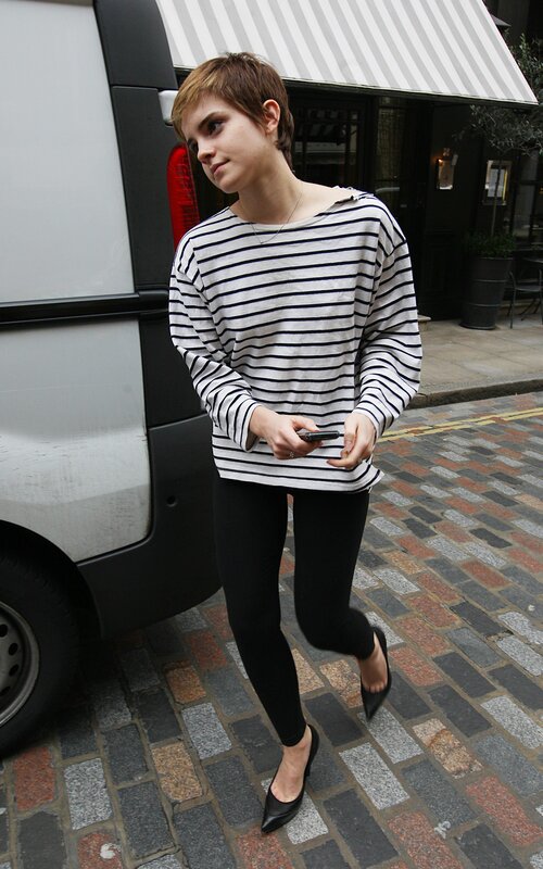 woman in striped shirt walking