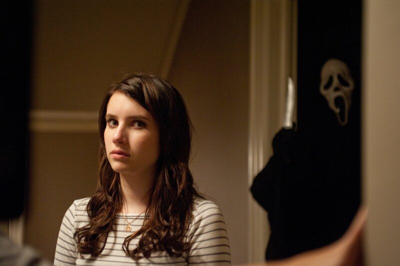 woman in striped shirt with ghost face