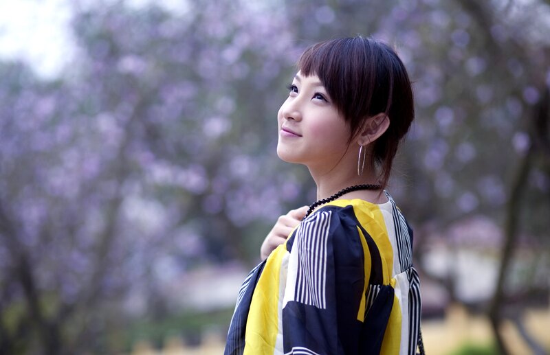Woman in Striped Shirt — Yellow, Serene, Spring