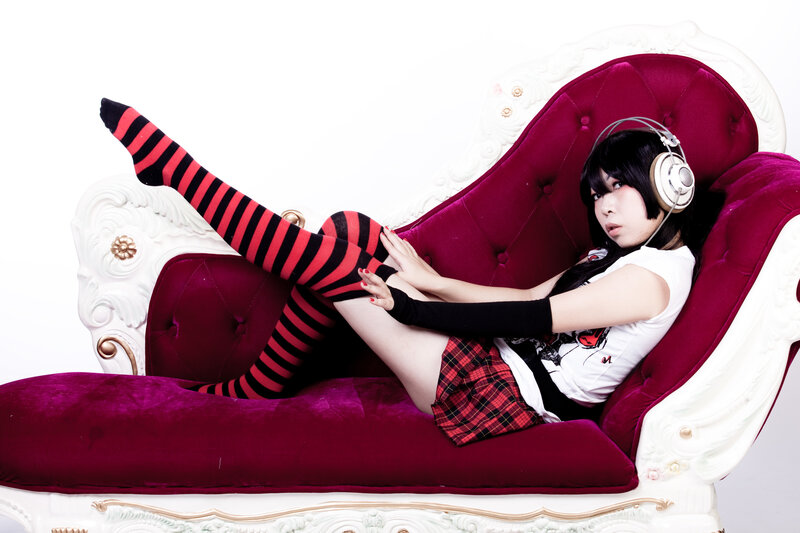 woman in striped socks on chaise