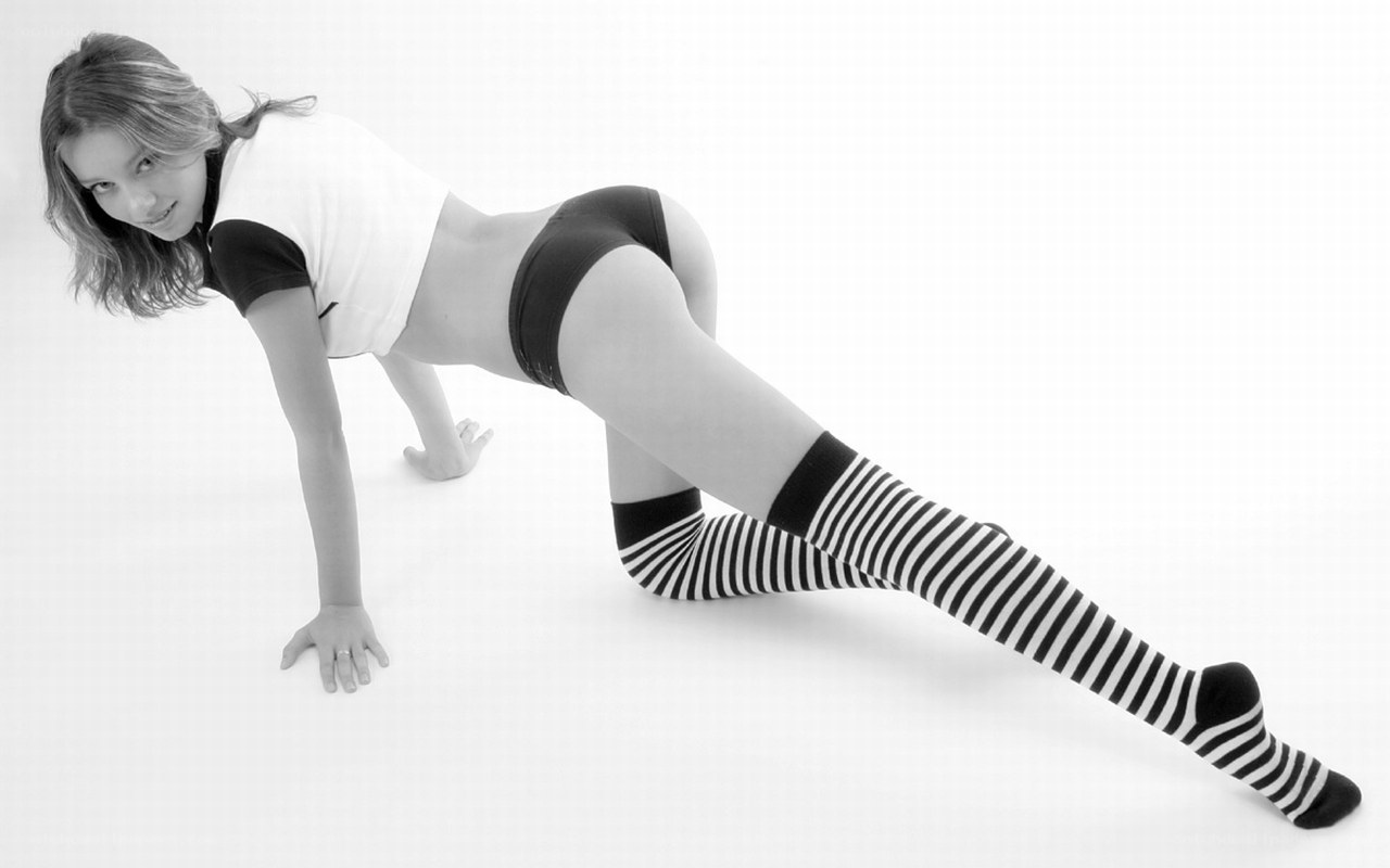 woman in striped socks posing