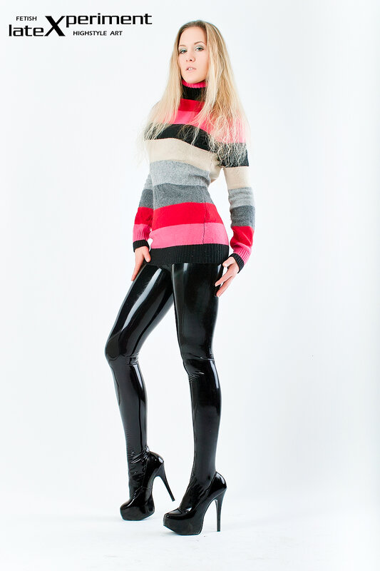 woman in striped sweater and latex pants