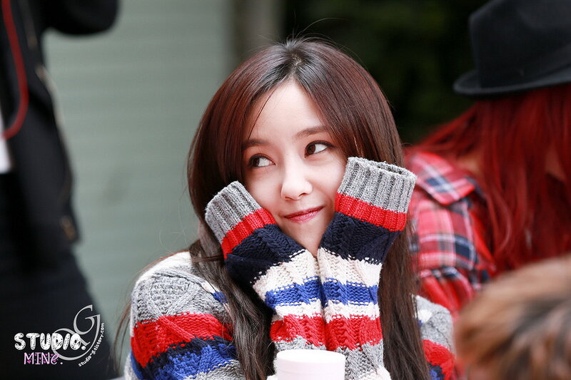 Woman in Striped Sweater — Gray, Playful