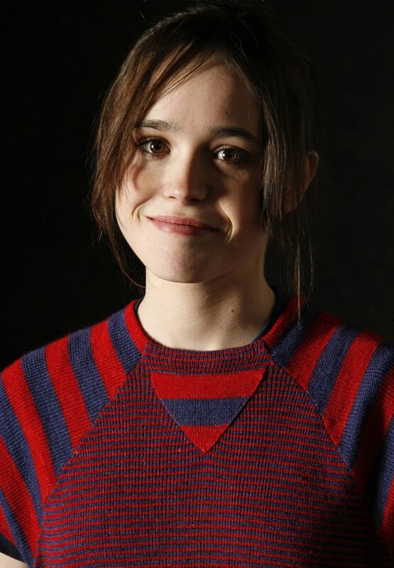 Woman in Striped Sweater — Red, Neutral, Photograph, Dark Background